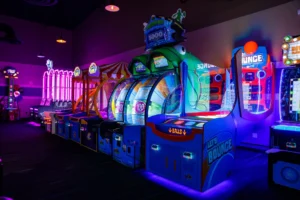 Kids' arcade games glowing at HeadPinz family entertainment center in Cape Coral